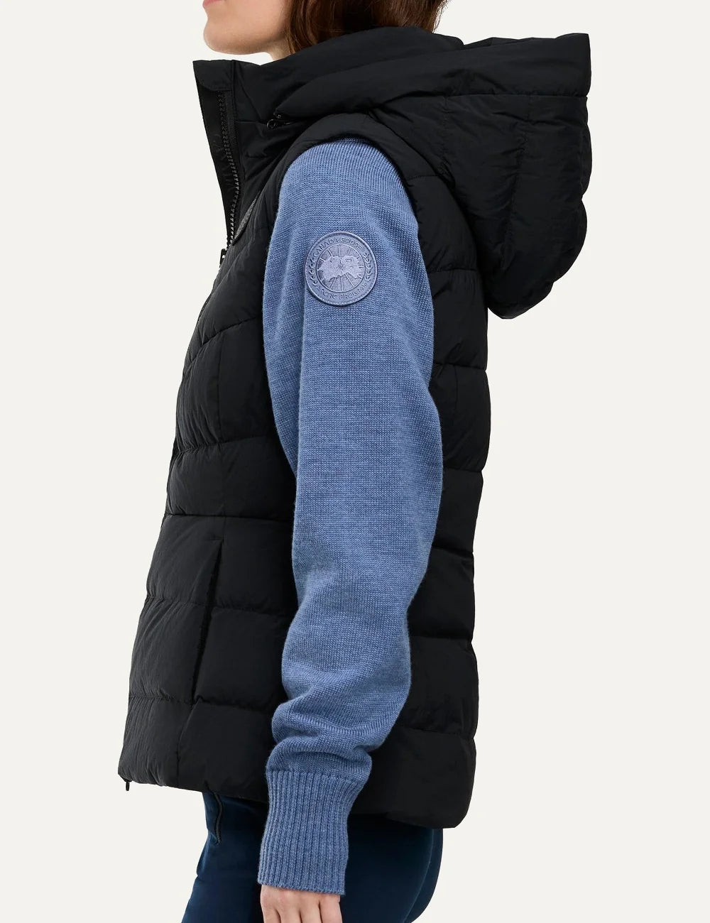 Canada Goose women's Clair Vest black quilted sleeveless jacket with removable hood, fitted silhouette and zippered pockets side