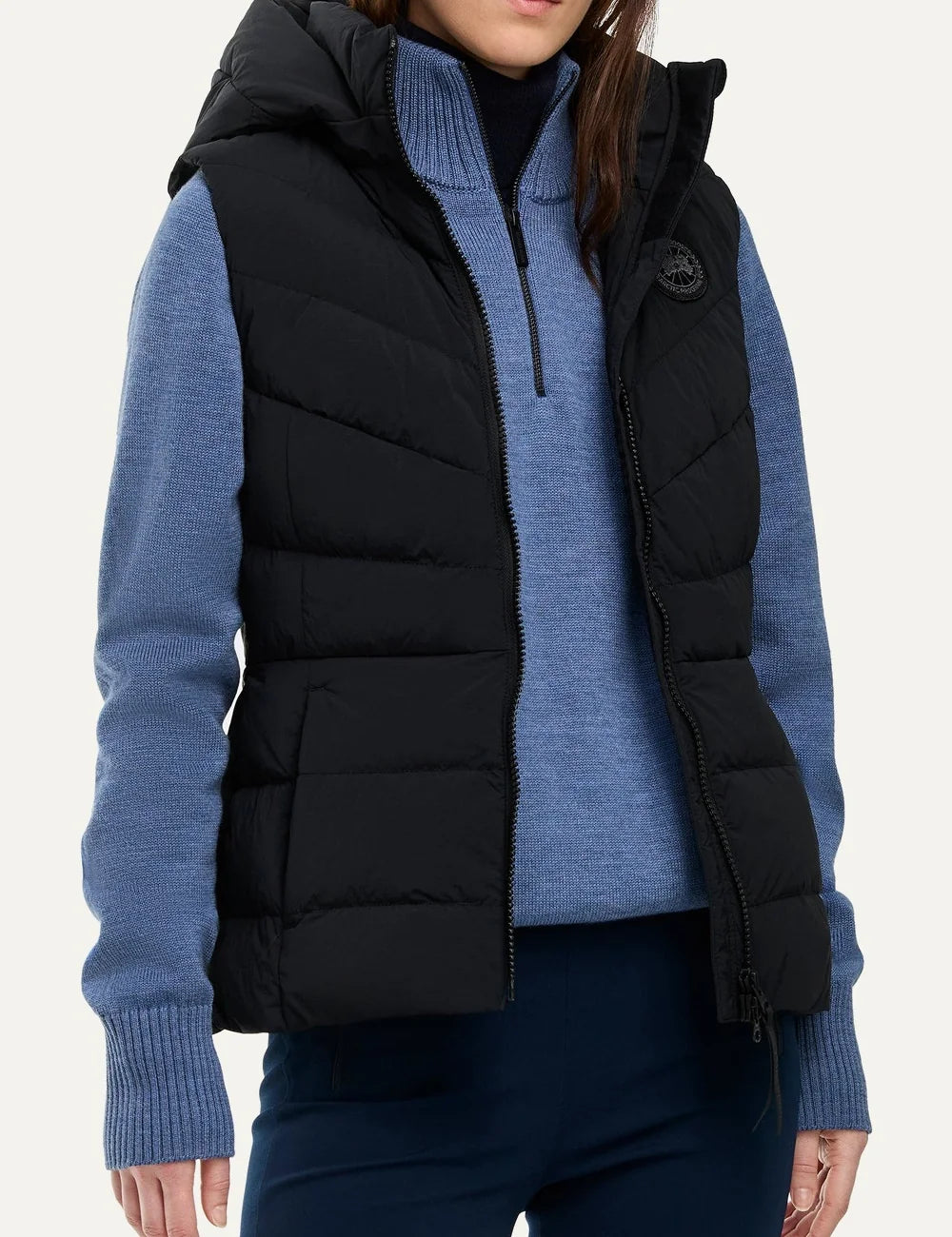 Canada Goose women's Clair Vest black quilted sleeveless jacket with removable hood, fitted silhouette and zippered pockets model