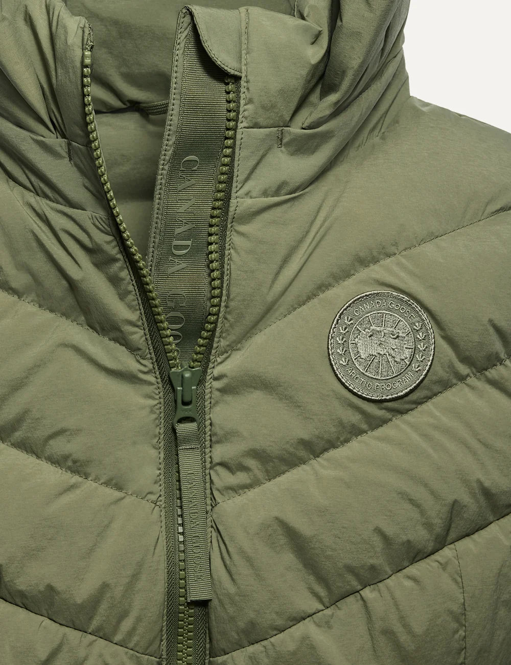 Canada Goose women's Clair Vest olive green quilted sleeveless puffer jacket with removable adjustable hood, fitted waist, two-way zipper and fleece-lined pockets detail
