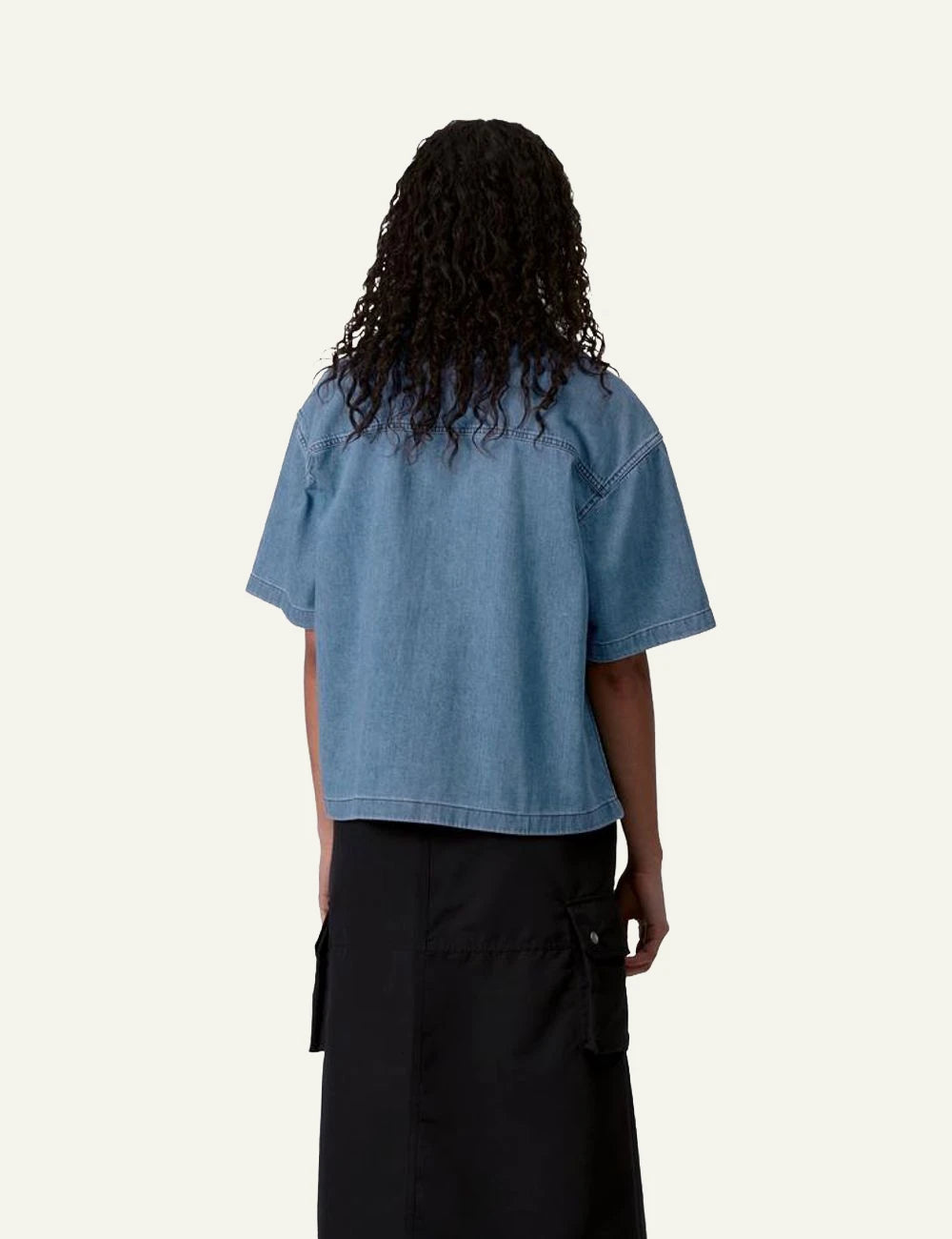 Carhartt short sleeve denim shirt in blue with chest pocket back model view