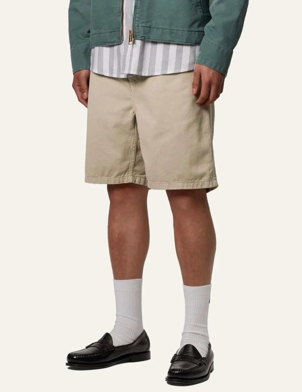 Carhartt WIP beige cotton shorts with elastic waistband side model view