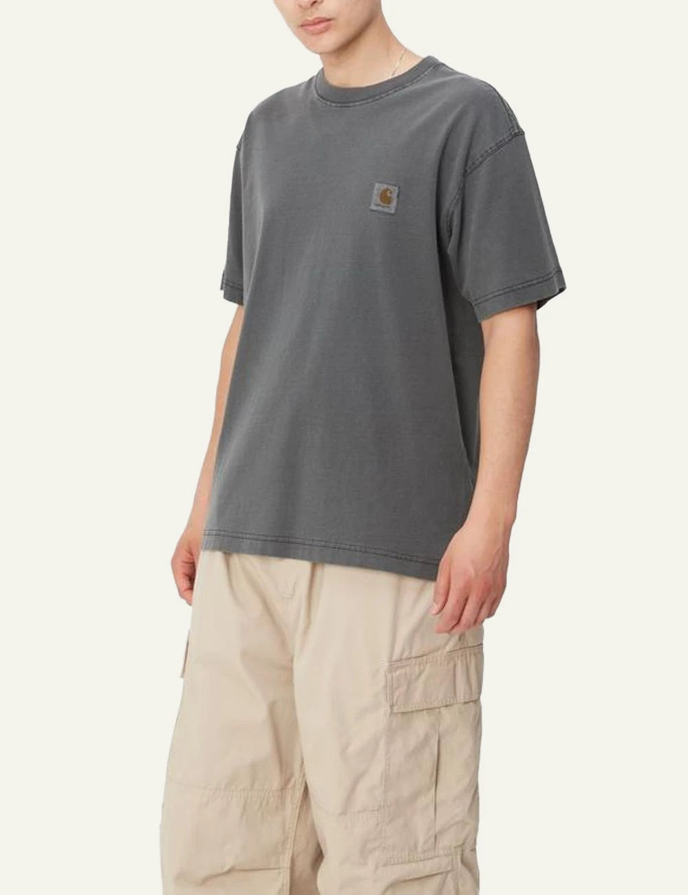 Carhartt WIP dark grey t-shirt with chest logo patch side model view