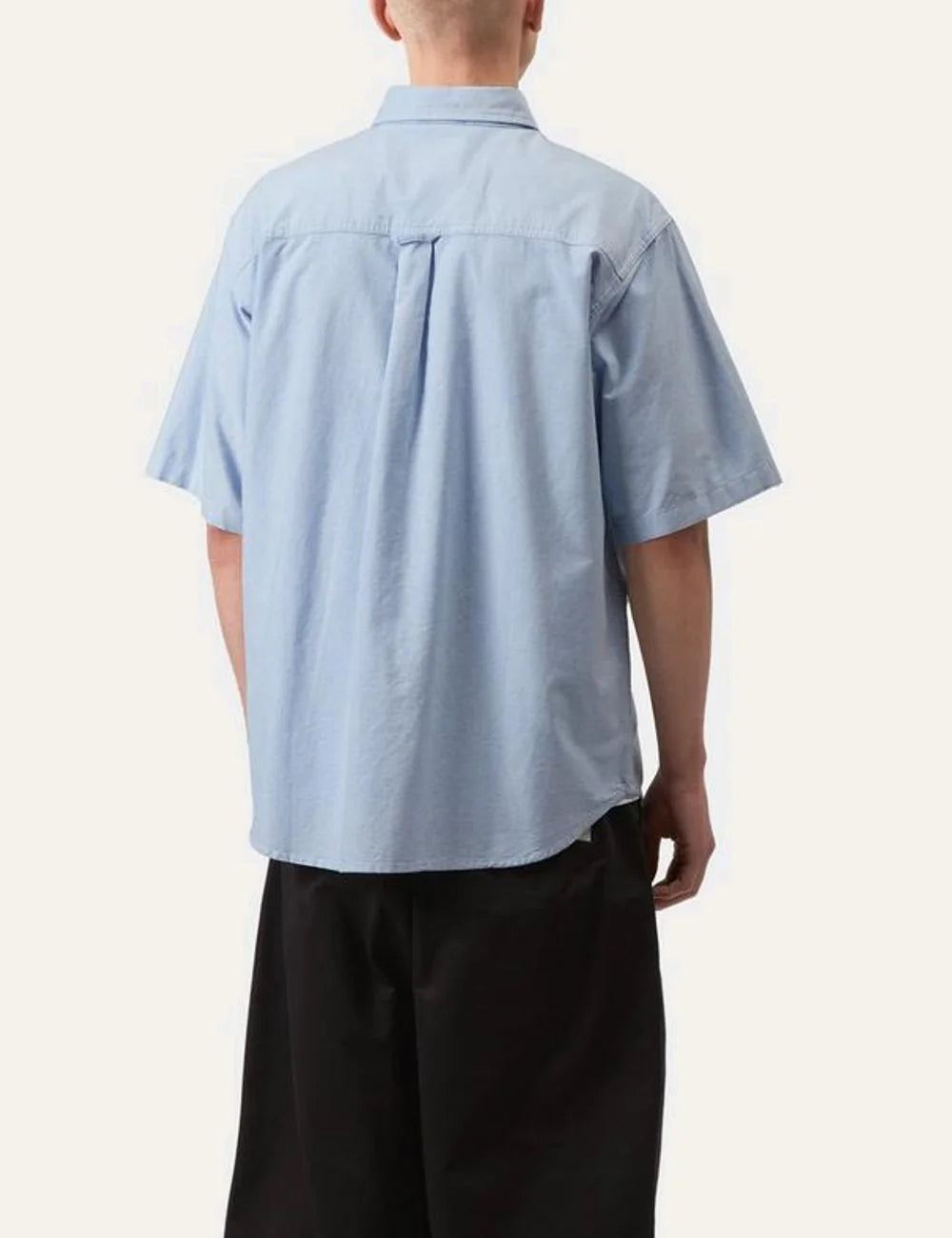 Carhartt WIP light blue short sleeve button-down shirt with chest pocket back model view