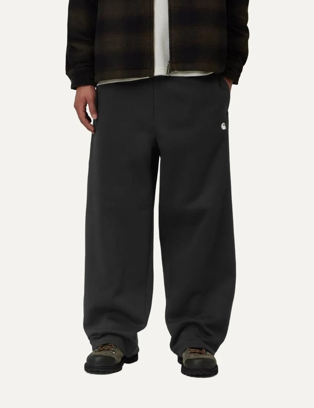 Carhartt WIP men Mack black loose-fit sweatpants with elasticated waist and embroidered C logo model