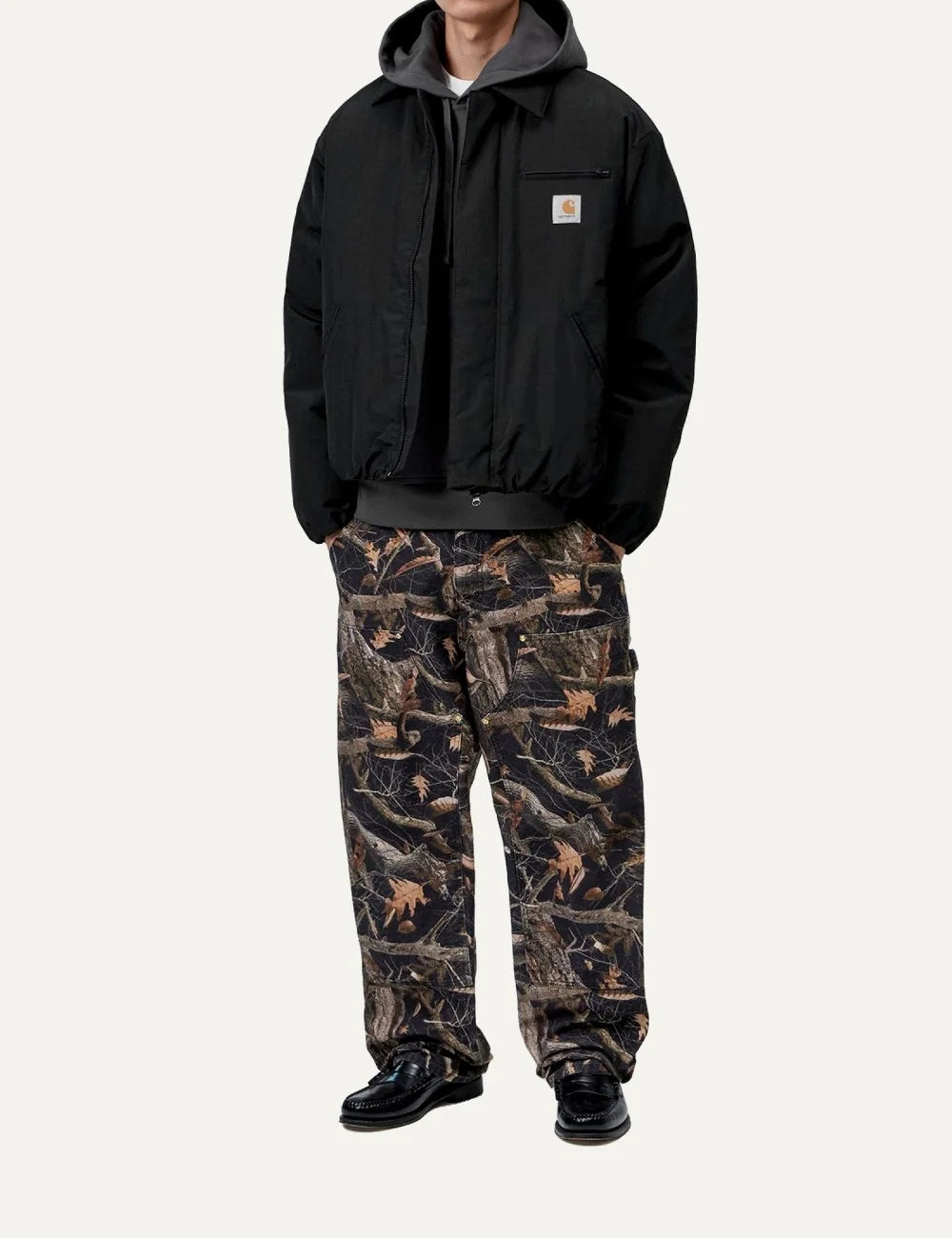 Carhartt WIP men Stanwood black water-repellent nylon jacket with chest zip pocket and logo label full body