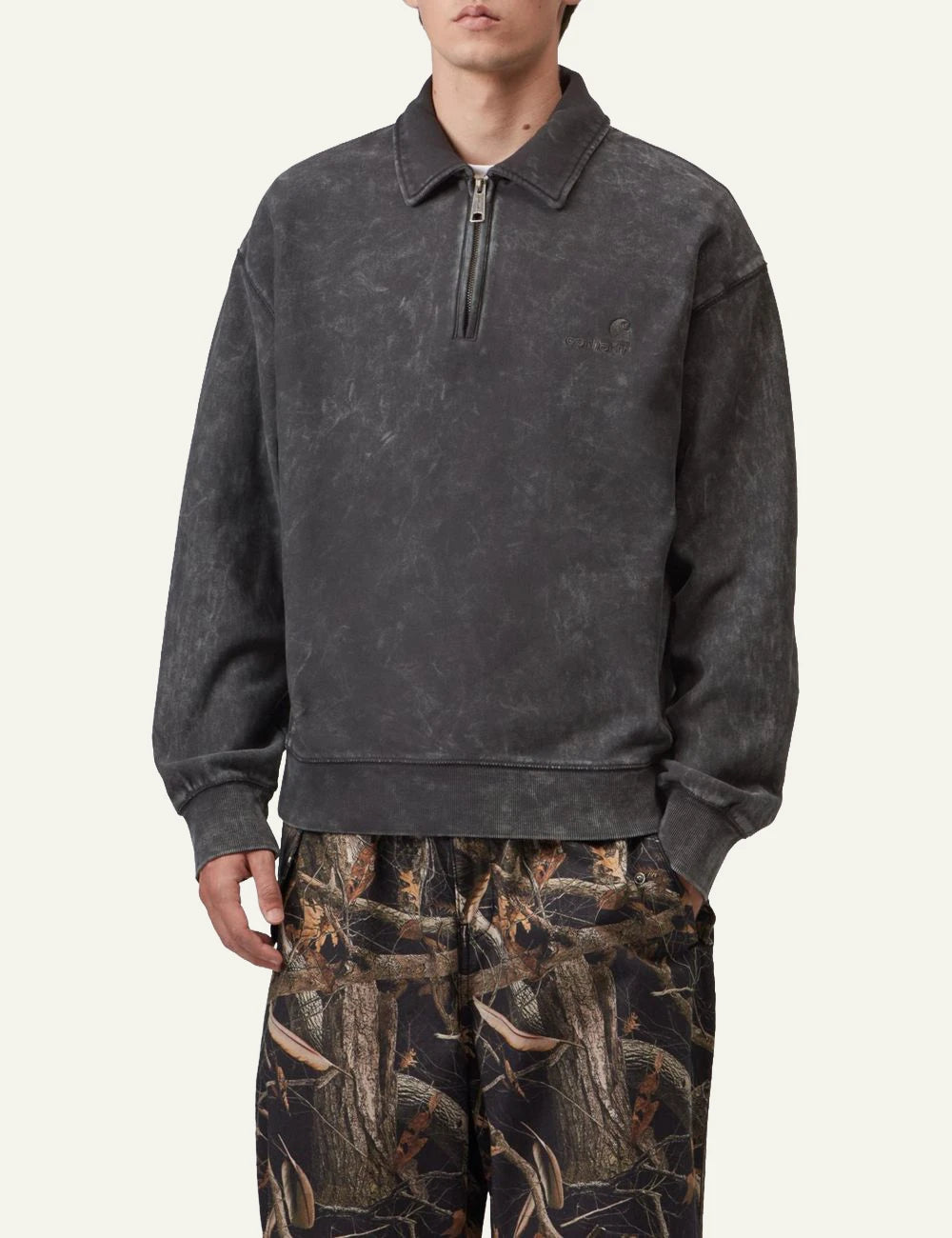 Men's Carhartt WIP dark charcoal cotton half-zip polo sweatshirt with tonal logo model