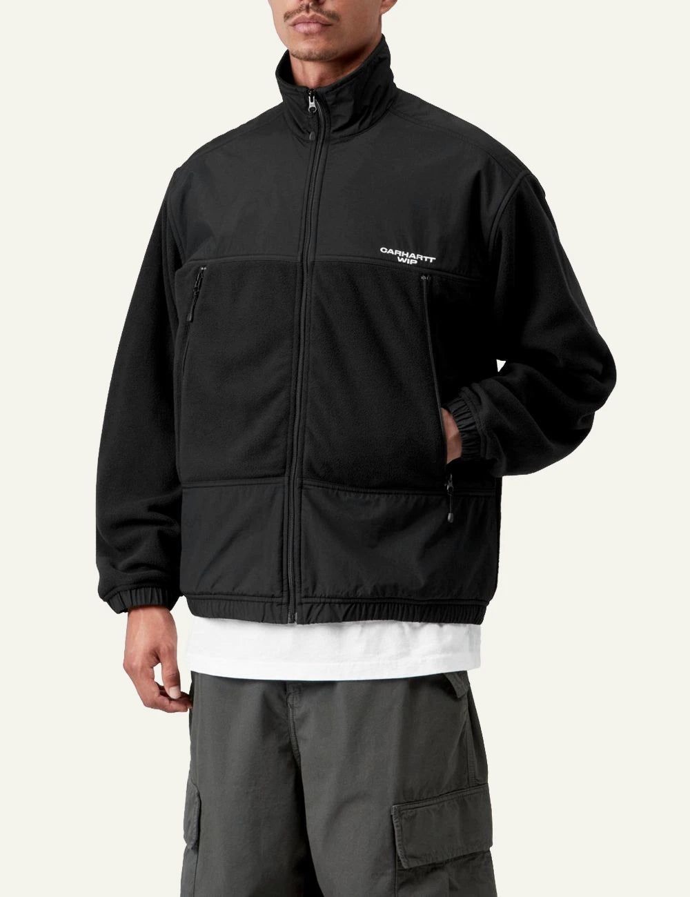 Men's Carhartt WIP Edmore Jacket in black fleece with zip pockets and embroidered logo model