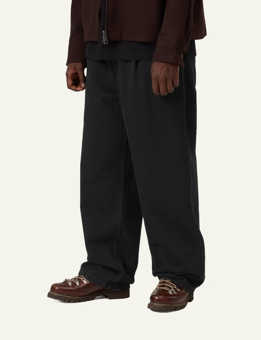 Men's Carhartt WIP Jace Pant in black cotton denim with loose tapered fit side