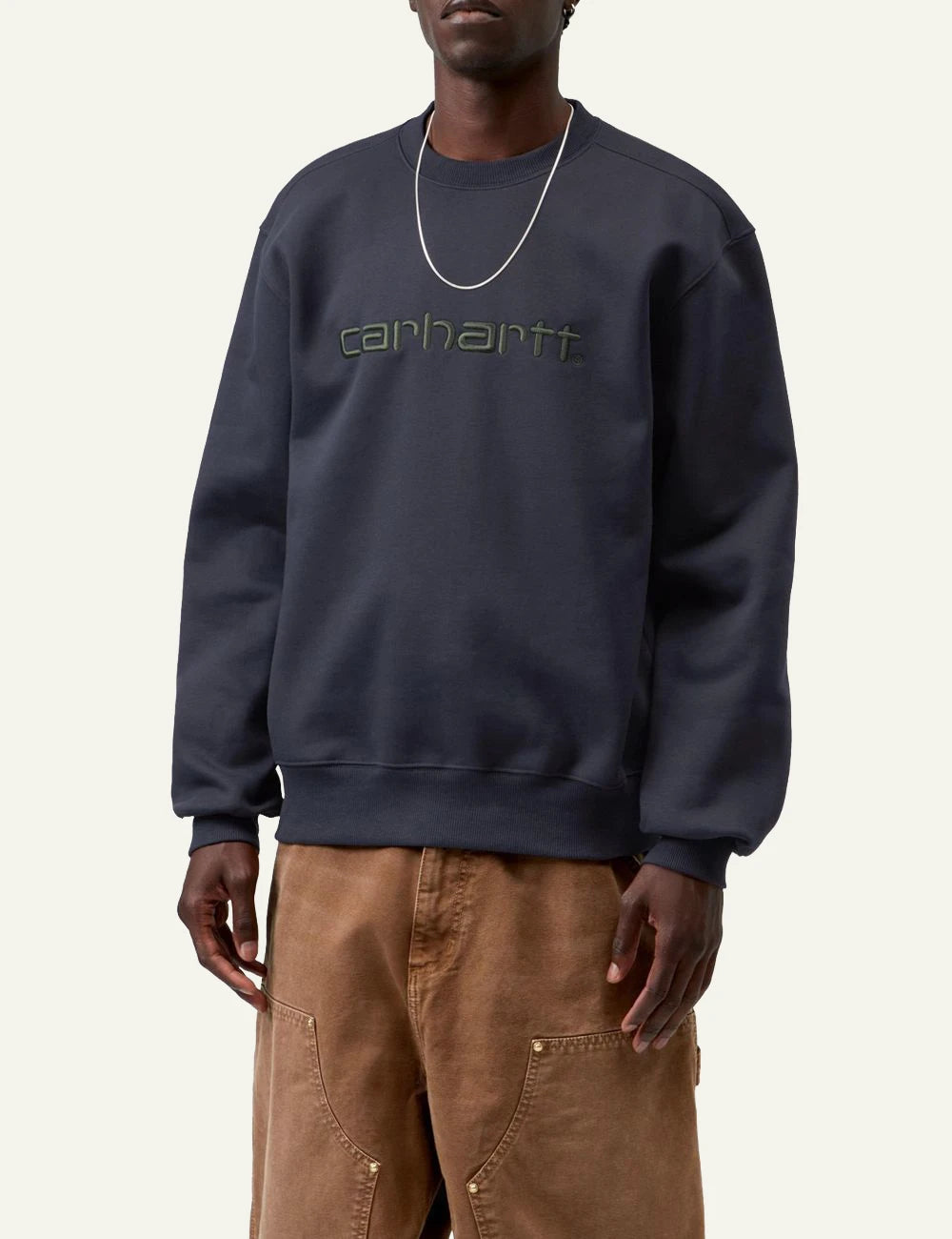 Men's Carhartt WIP navy crewneck sweatshirt with embroidered script logo model