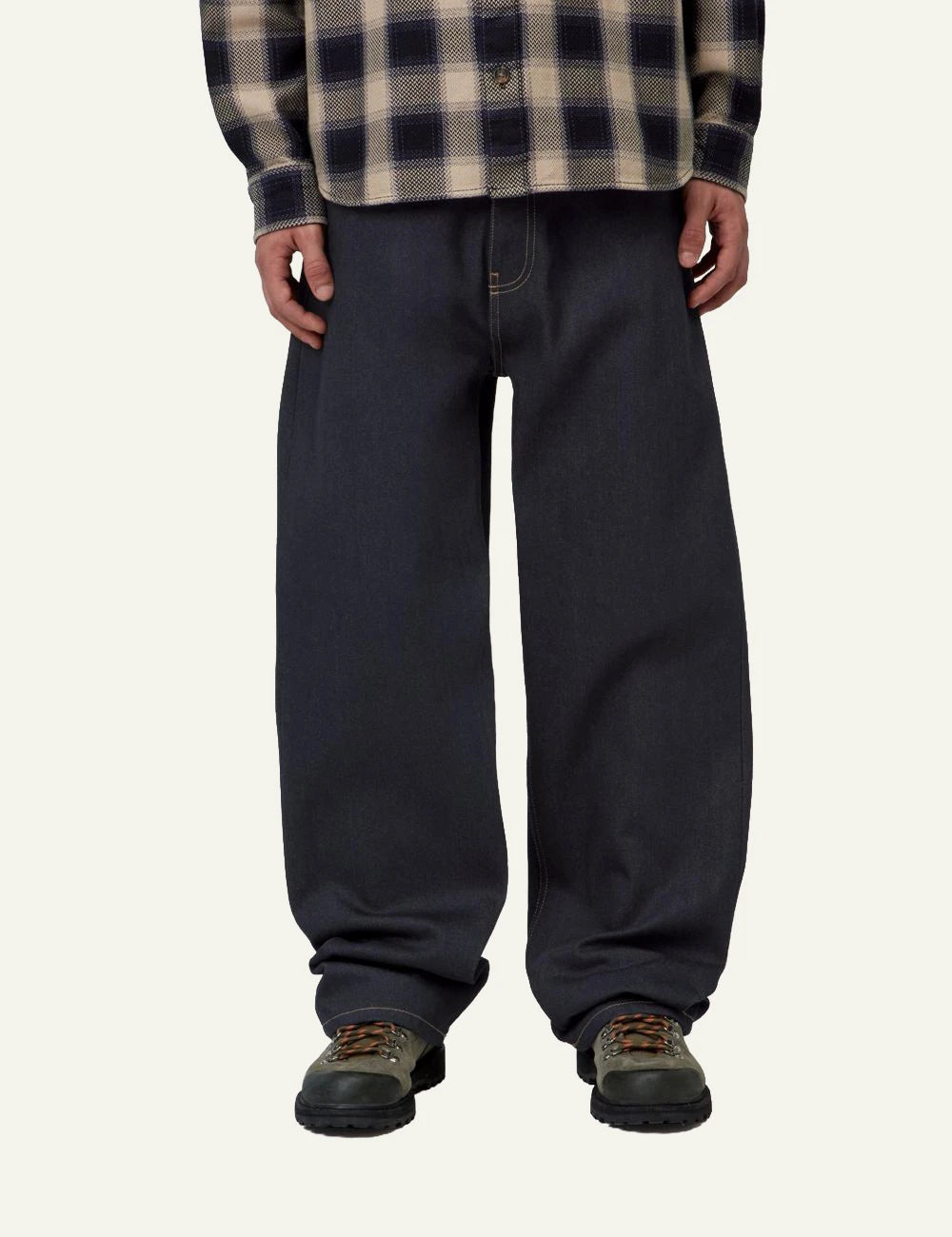 Men's Carhartt WIP Payson Pant in dark blue denim with wide straight fi model