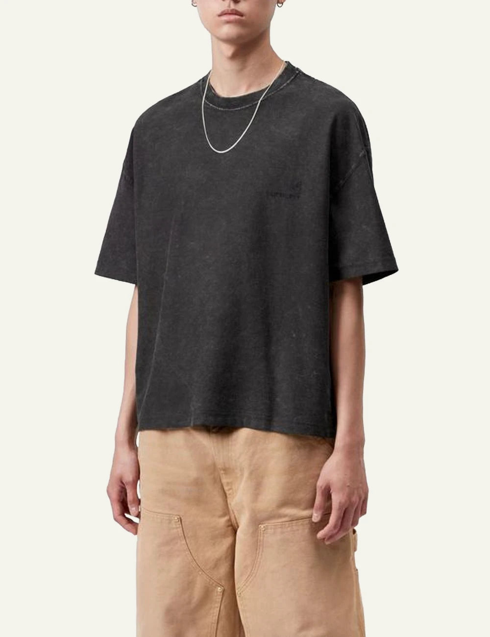 Men's Carhartt WIP S/S Lambert T-Shirt in black with moon wash finish and tonal logo model