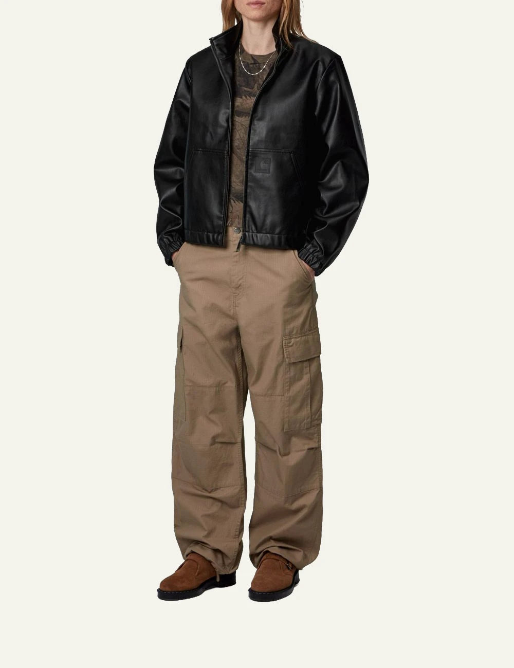 Women's Carhartt WIP black faux leather jacket with stand collar and kangaroo pocket full body