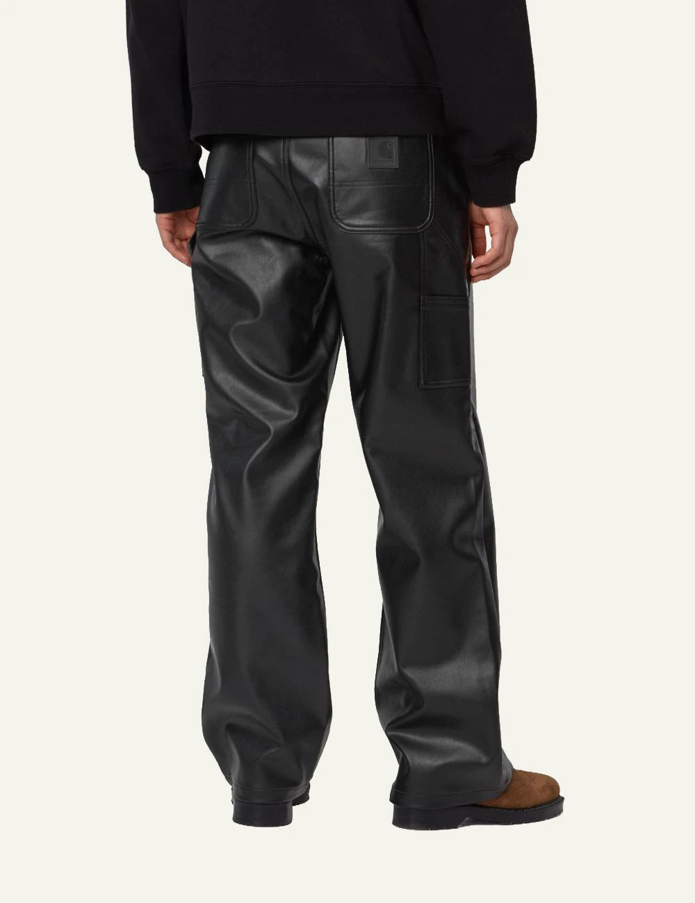 Women's Carhartt WIP black faux leather straight leg work pants with utility pockets back