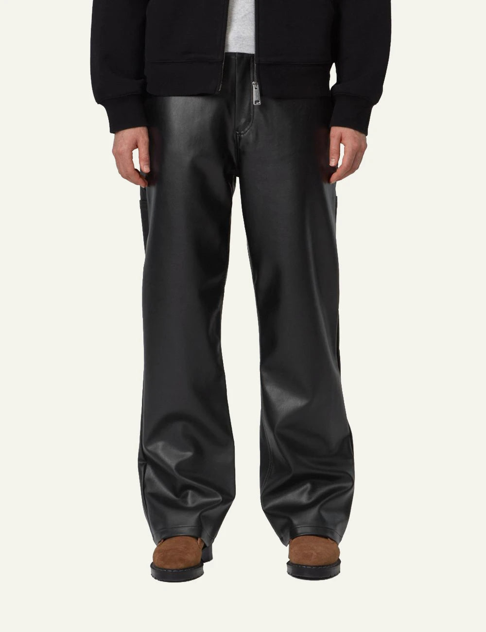 Women's Carhartt WIP black faux leather straight leg work pants with utility pockets model