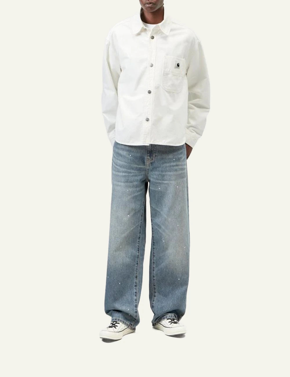 Carhartt WIP Arin jeans light blue destroy wash with paint details front full body view