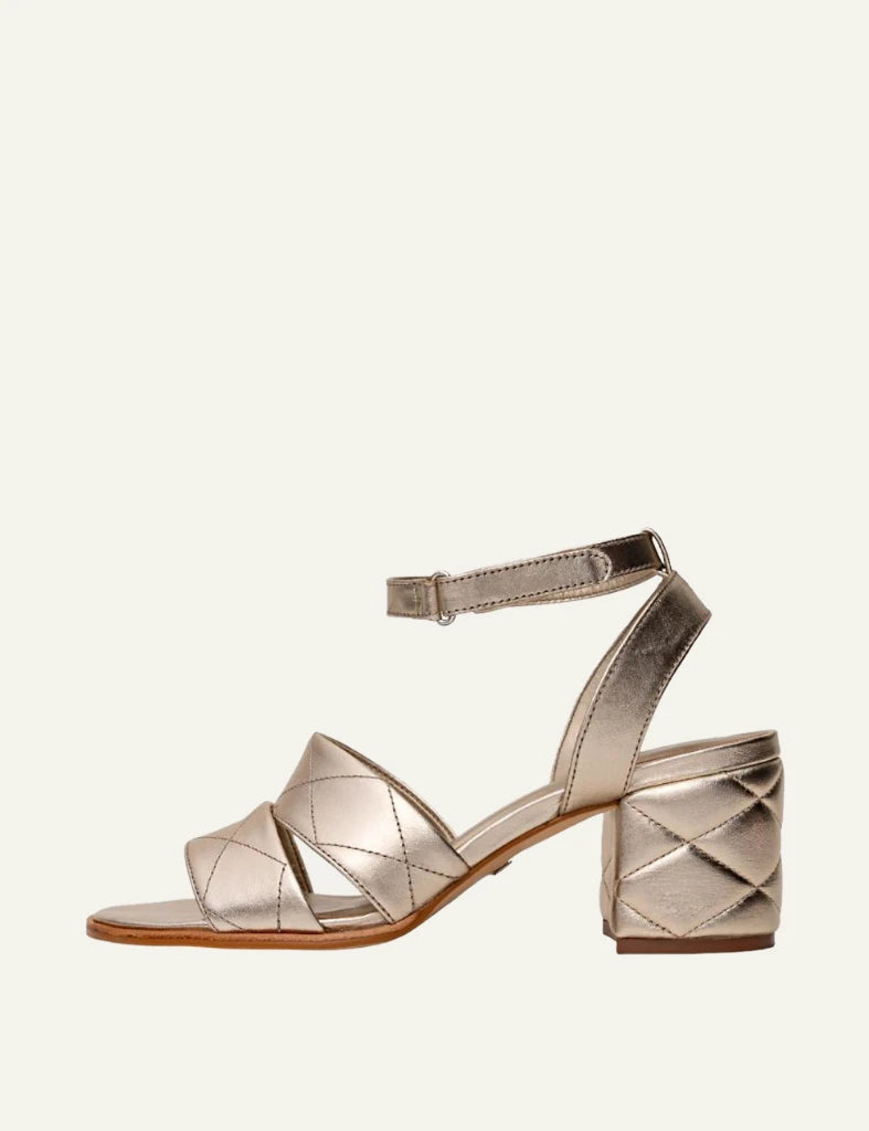 Carrano block heel sandal leather gold quilted straps profile view