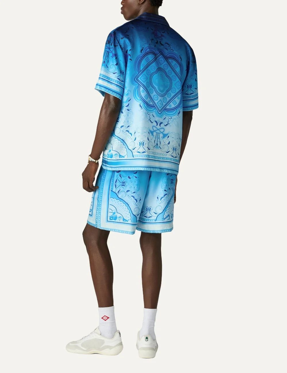 Casablanca men's blue silk shorts with Egyptian-inspired geometric print back