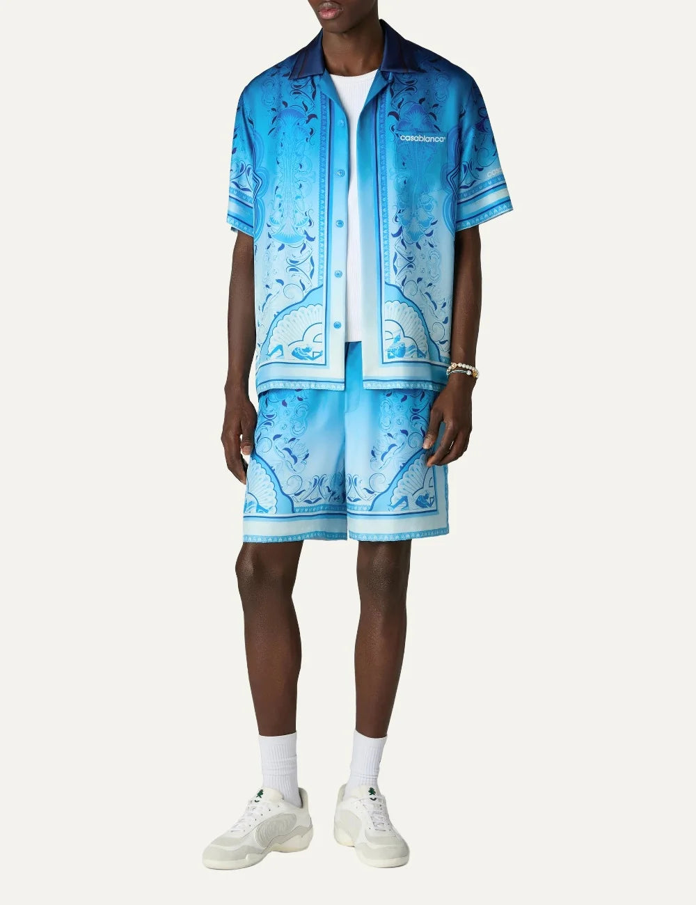 Casablanca men's blue silk shorts with Egyptian-inspired geometric print full body