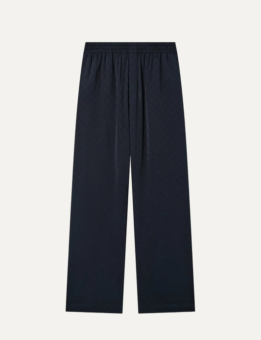 Casablanca men's dark navy monogram viscose trousers with tonal interlocking CC pattern, elastic waistband and straight legs.