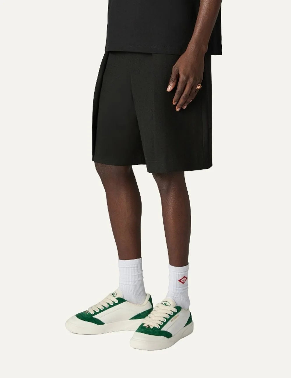 Casablanca Del Mar men's white and green low-top sneakers with green suede overlays, white laces, side logo, rubber toe cap and chunky white rubber sole.