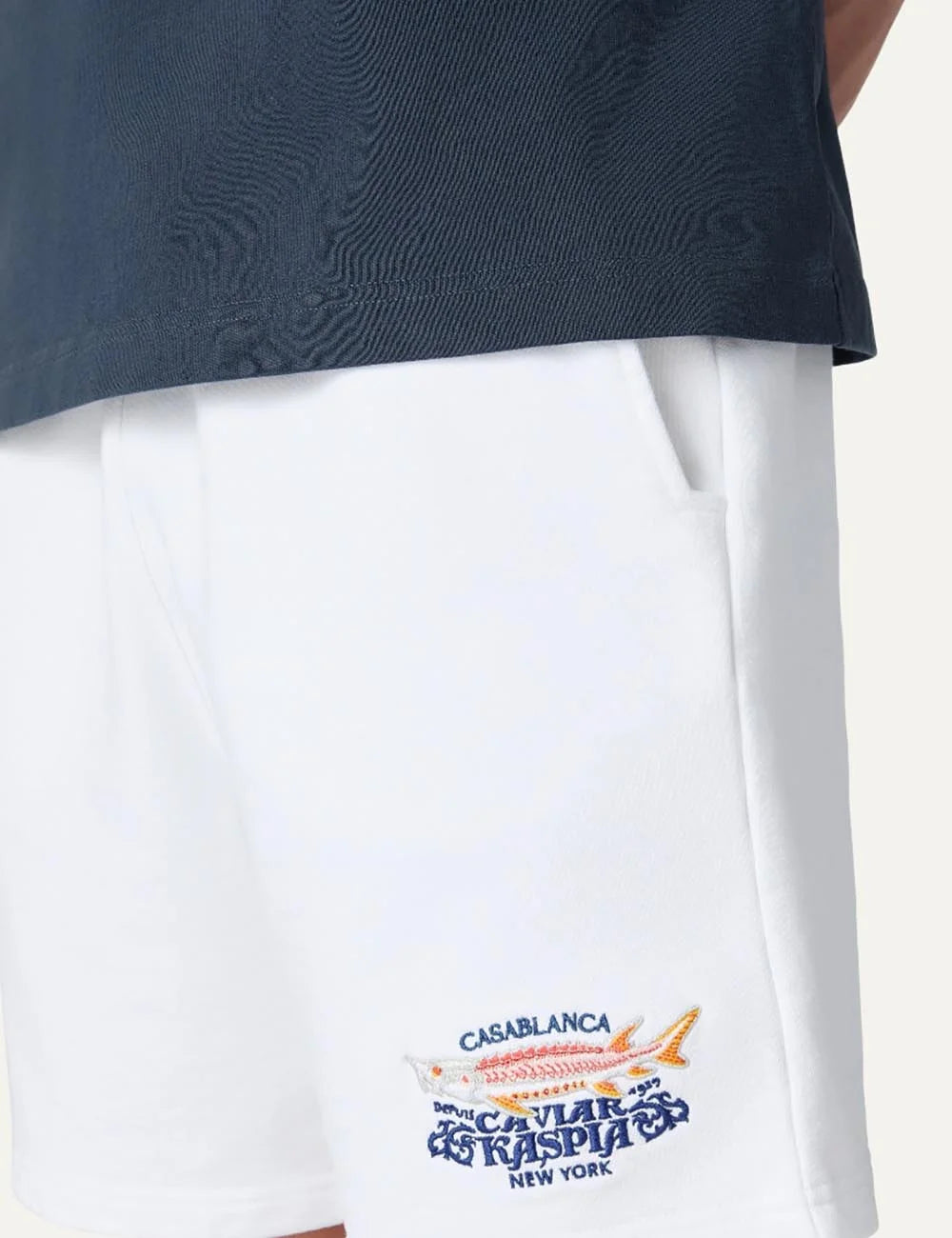 Casablanca men's white organic cotton shorts with Caviar Kaspia graphic detail