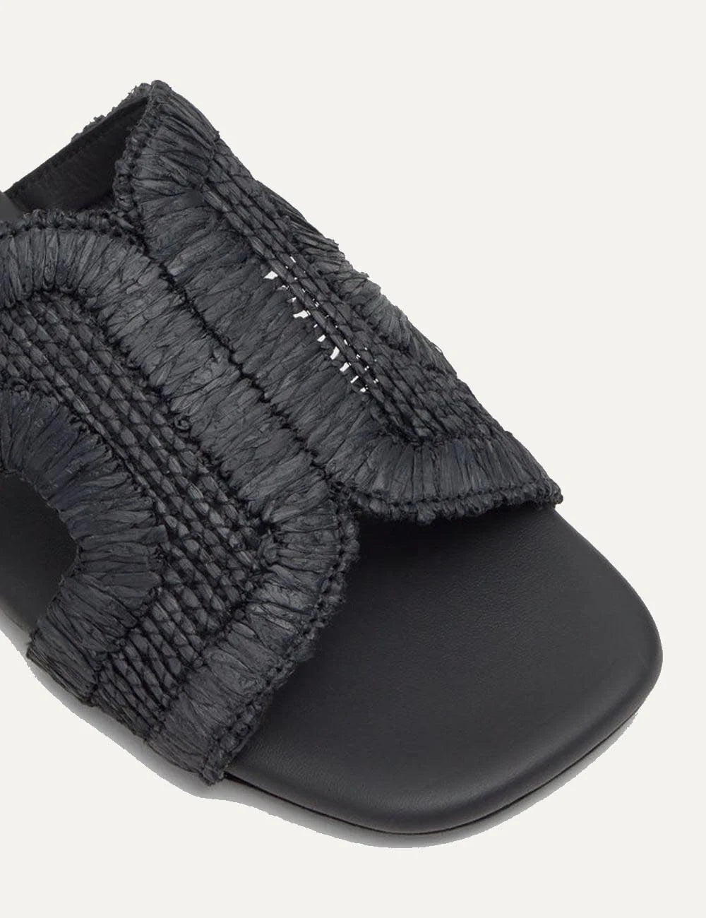 Castaner fringe slide sandals black double strap angled top view