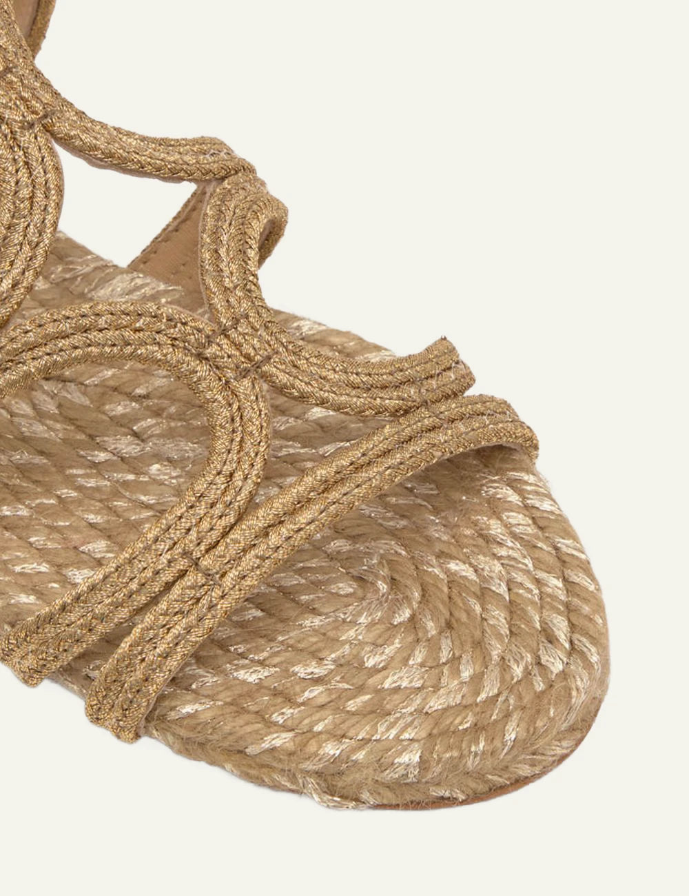 Castaner gold woven flat sandals ankle strap angled detail view