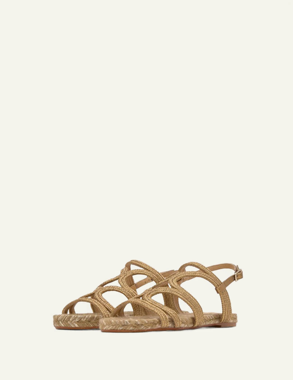 Castaner gold woven flat sandals ankle strap profile view