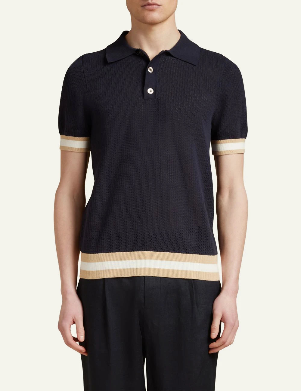Che navy knitted polo t-shirt perforated texture contrast hem front model