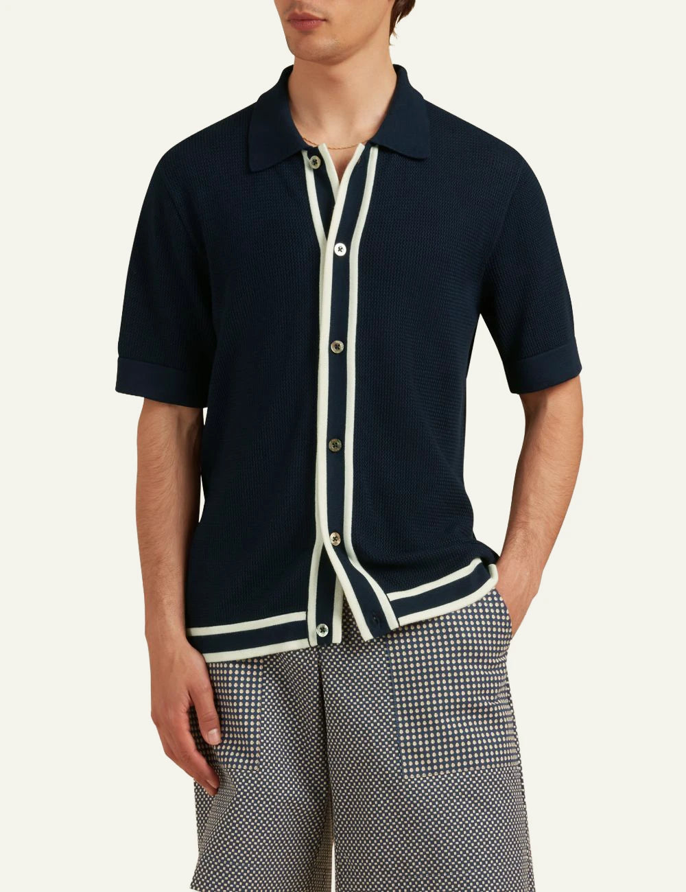 Che navy knitted polo stripe placket front model