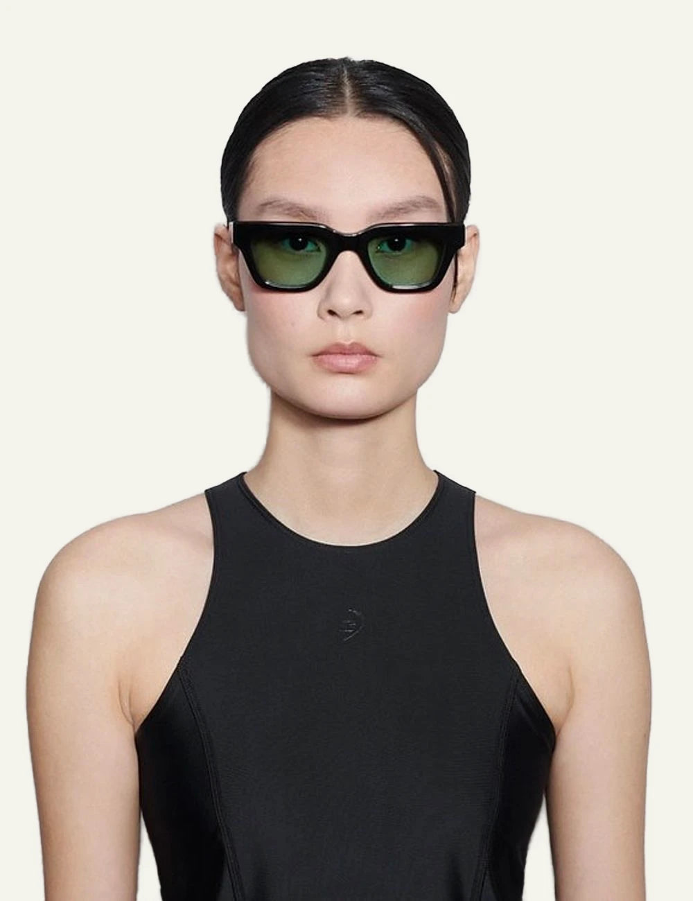 Chimi black geometric sunglasses with green lenses front view worn by model