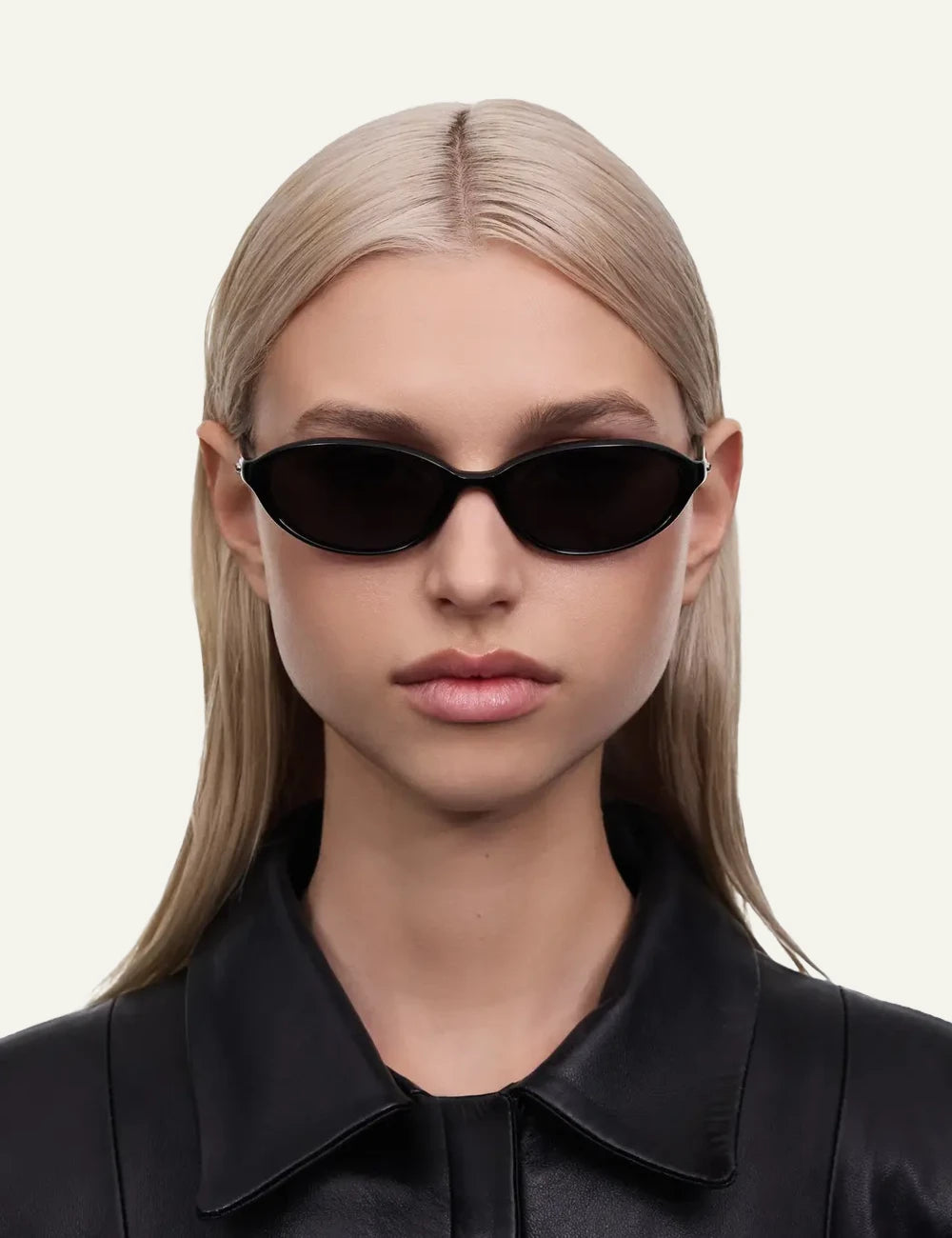 Chimi Oval Sunglasses Black Black Lens Front View worn by model