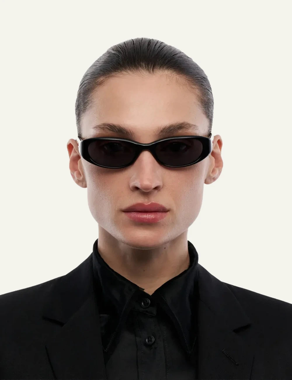 Chimi Slim Oval Sunglasses Black Black Lens Front View worn by model