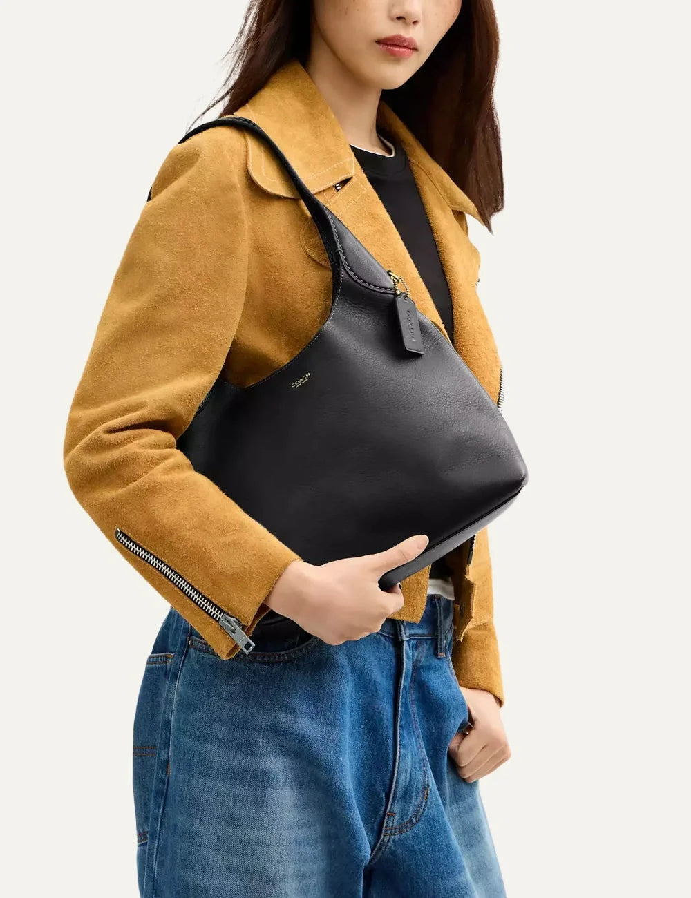 Coach women's Brooklyn 28 black natural grain leather hobo shoulder bag with gold-tone logo model