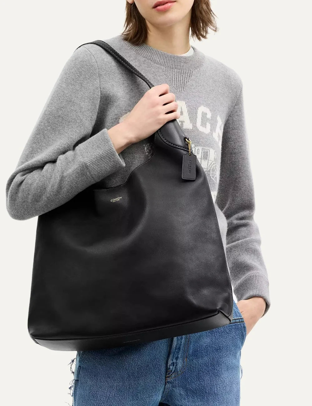 Coach women's Brooklyn 39 black natural grain leather hobo shoulder bag with gold-tone logo model