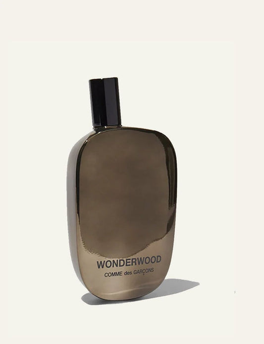 Comme des Garcons Wonderwood eau de parfum brown bottle angled front view