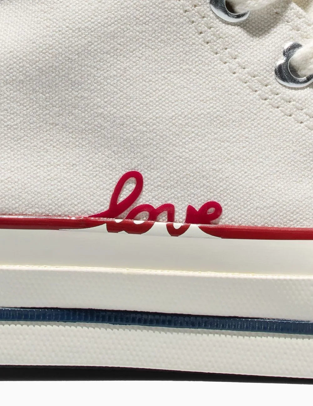 Converse Chuck Taylor All Star hi canvas white sneaker with red love embroidery left side detail view
