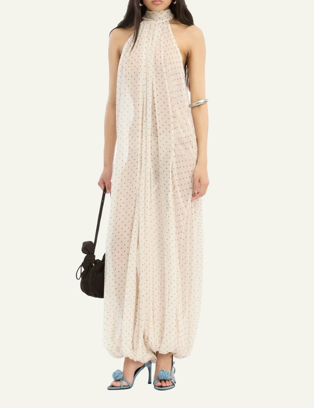 Cream chiffon balloon jumpsuit with halter neckline and polka dot print full body view
