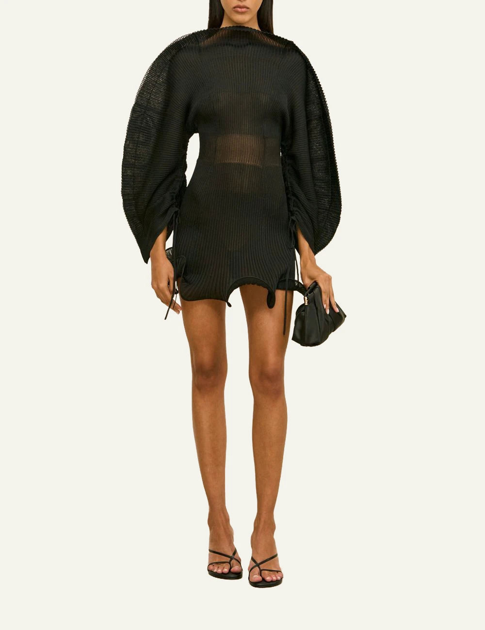 Women's Cult Gaia Jaylie black sheer knit mini dress with sculptural sleeves and wavy hem model