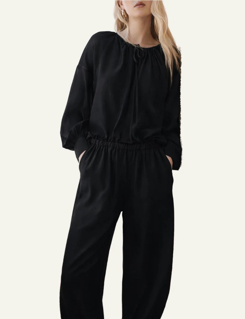 Devotion Twins Silkstone black pants elastic waist ankle detail front model view
