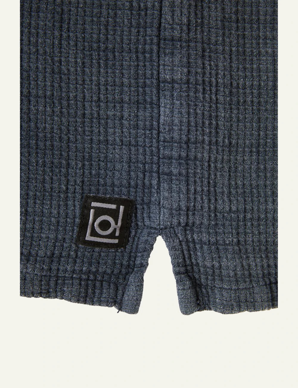 Dirty Laundry short sleeve shirt textured blue front logo view