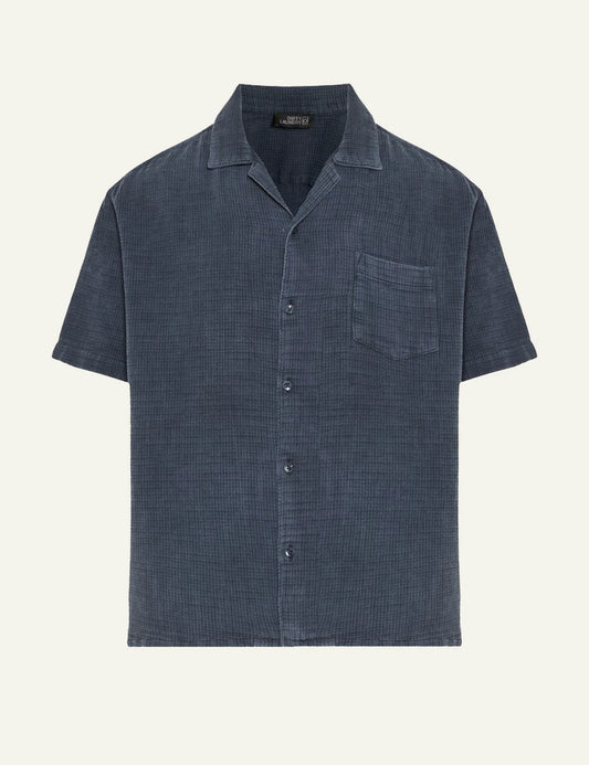 Dirty Laundry short sleeve shirt textured blue front flat view