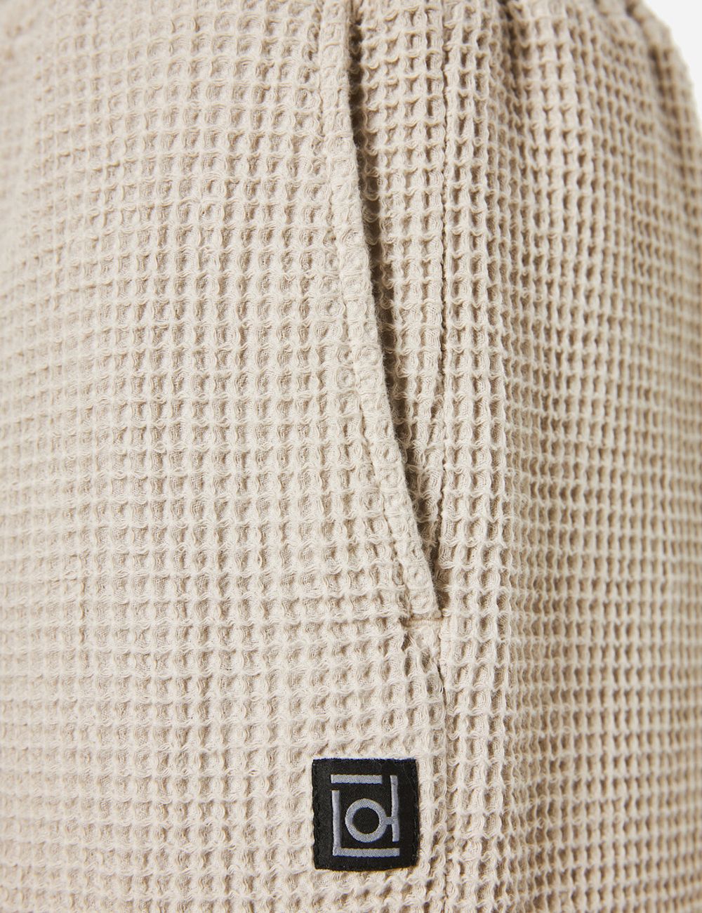 Dirty Laundry shorts sand waffle texture elastic waist drawstring side detail view