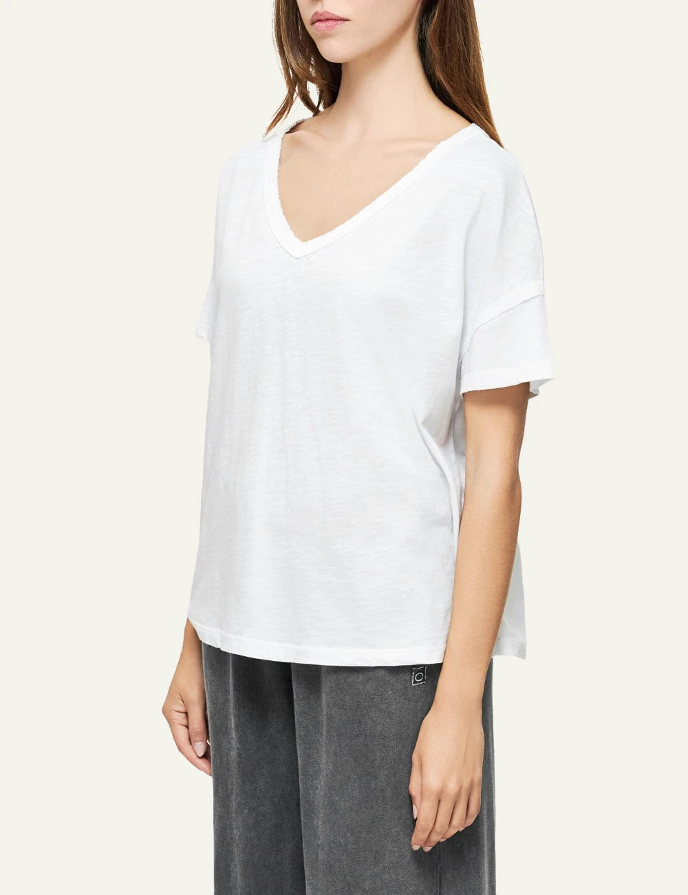 dirty laundry v neck t shirt white relaxed fit raw edges side view