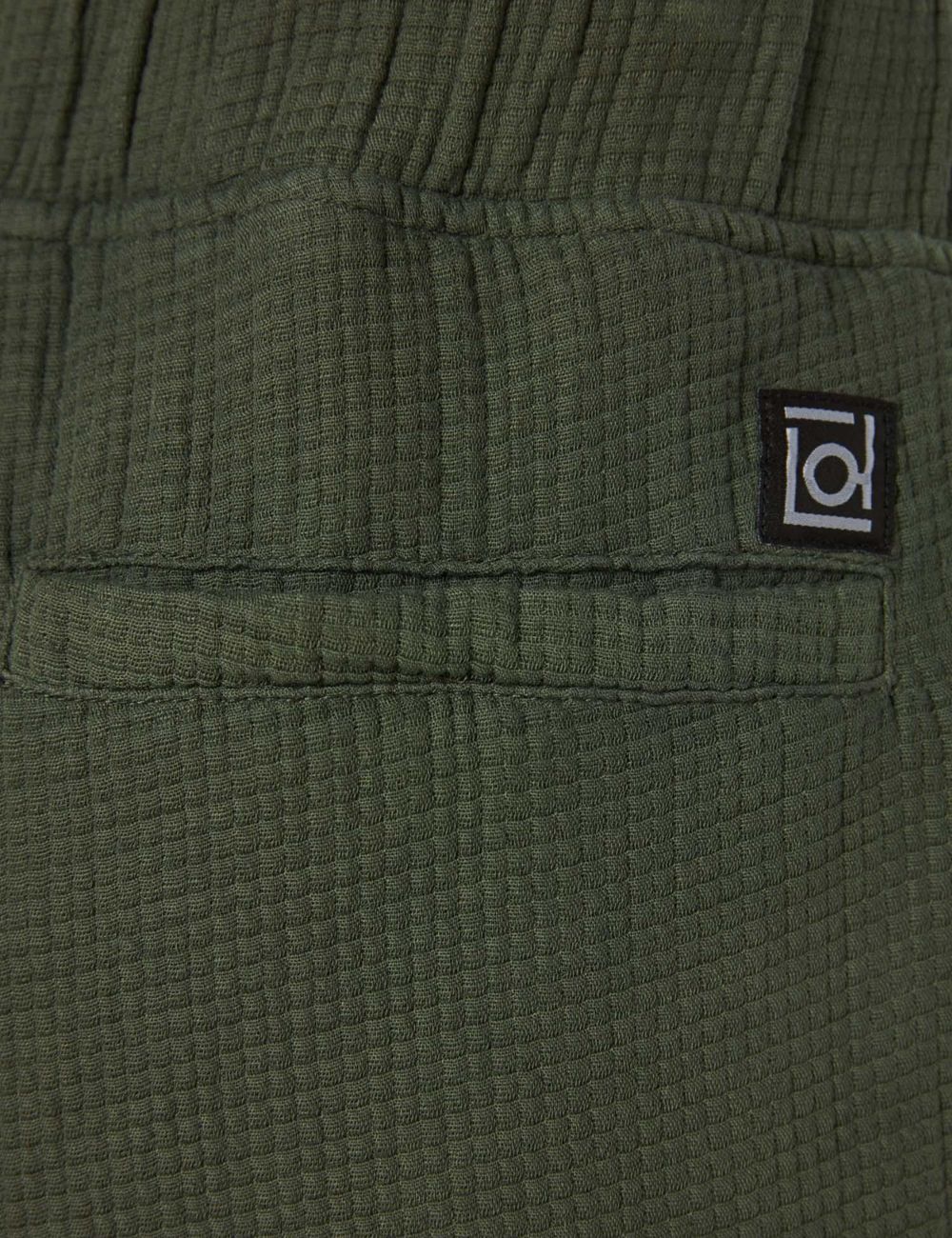 Dirty Laundry waffle shorts olive green elastic waist relaxed fit back detail view