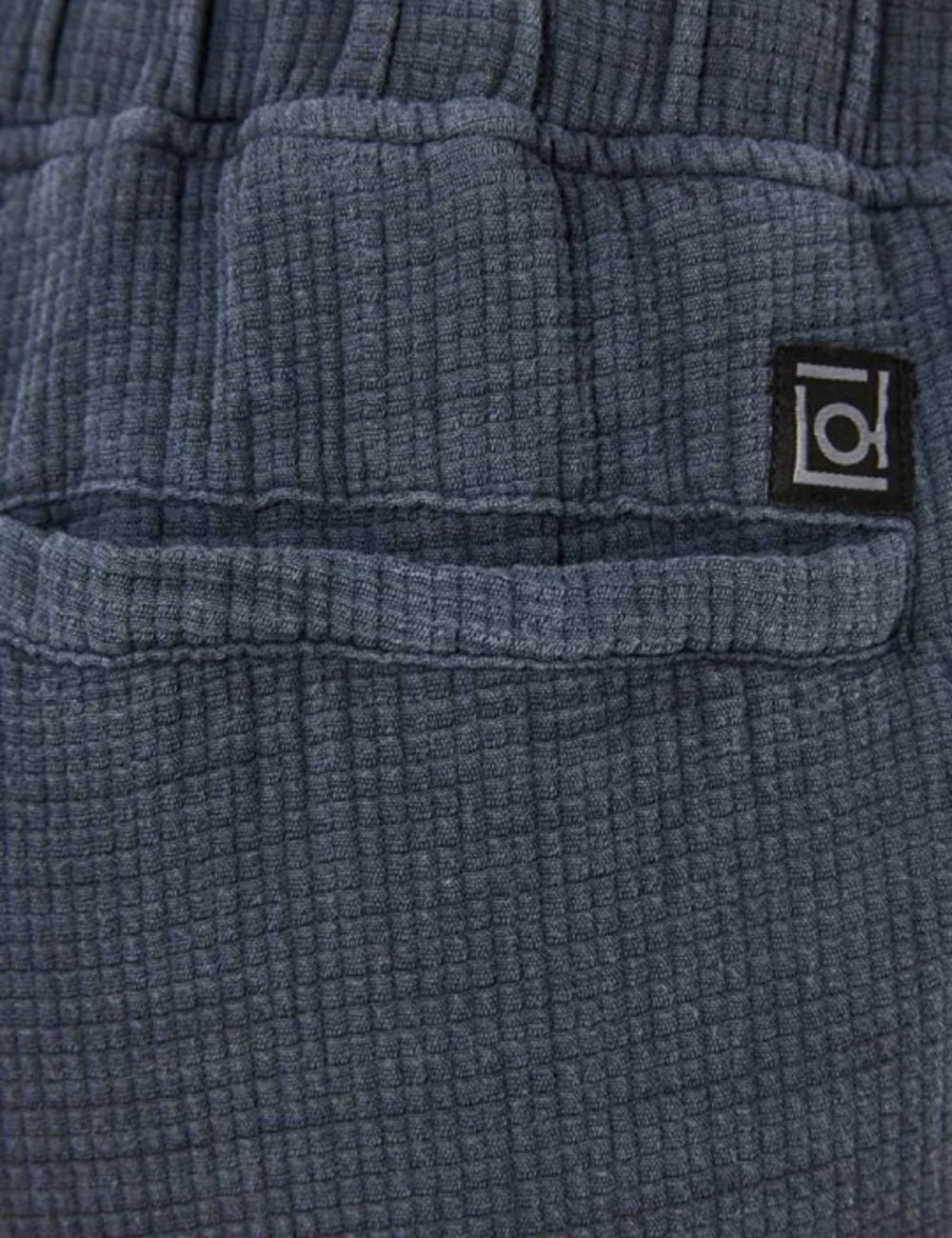 Dirty Laundry waffle shorts vintage blue elastic waist relaxed fit back detail model view