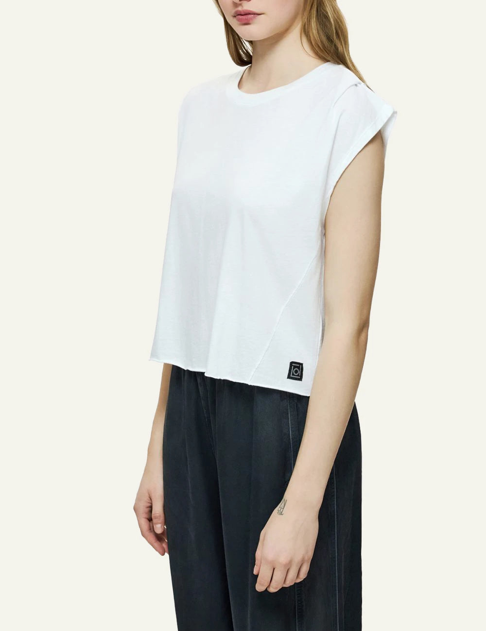 Dirty Laundry white sleeveless cropped t-shirt side model view