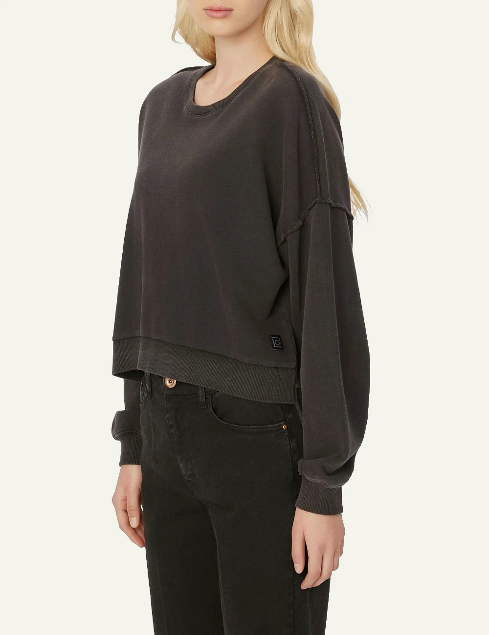 Women's Dirty Laundry faded black cotton sweatshirt with relaxed fit and asymmetric hem side
