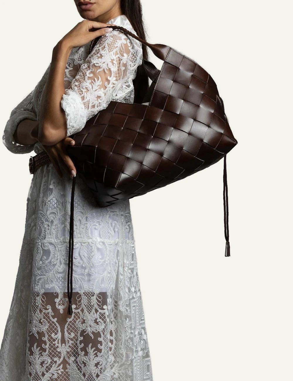 Dragon Diffusion Castello woven leather shoulder tote in dark brown on model