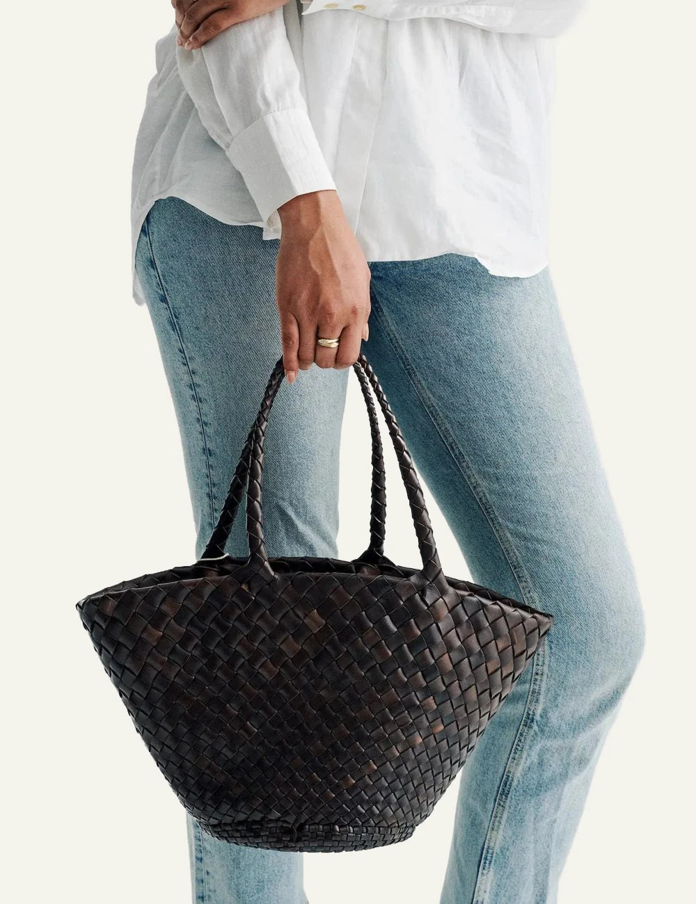 Dragon Diffusion dark brown woven leather basket bag with oversized shape worn on model
